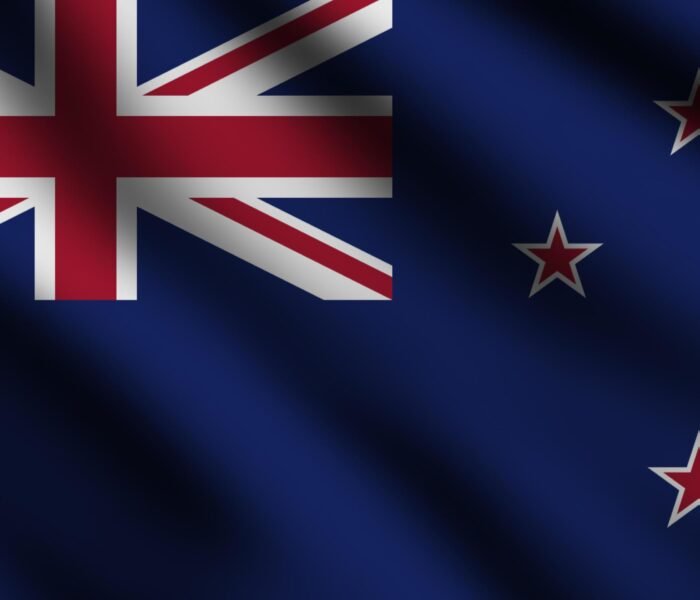 Close-up of the New Zealand flag featuring Union Jack and Southern Cross constellation, highlighting study abroad opportunities with ASK Consultants.